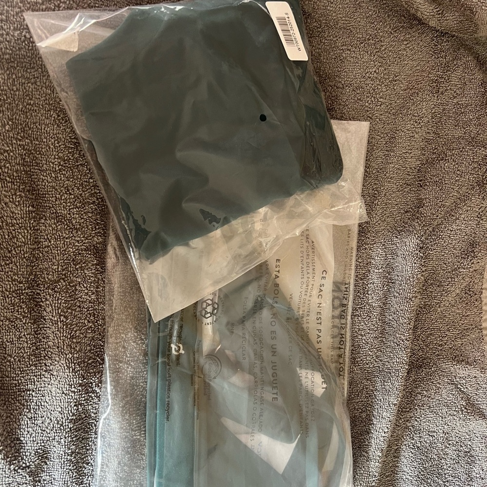 Peloton O- Ring one shoulder bra and leggings.